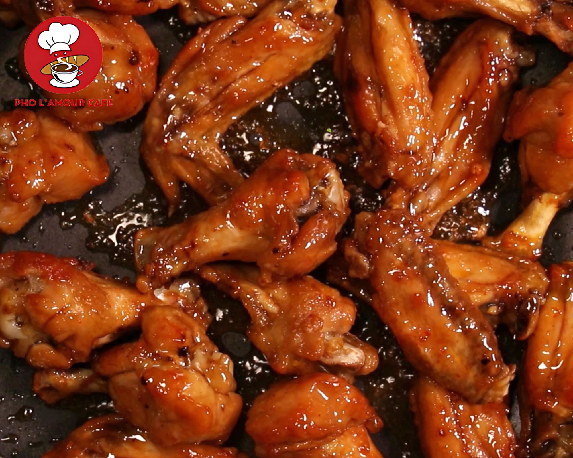 Sweet and salty glazed chicken wings served as a popular Vietnamese appetizer